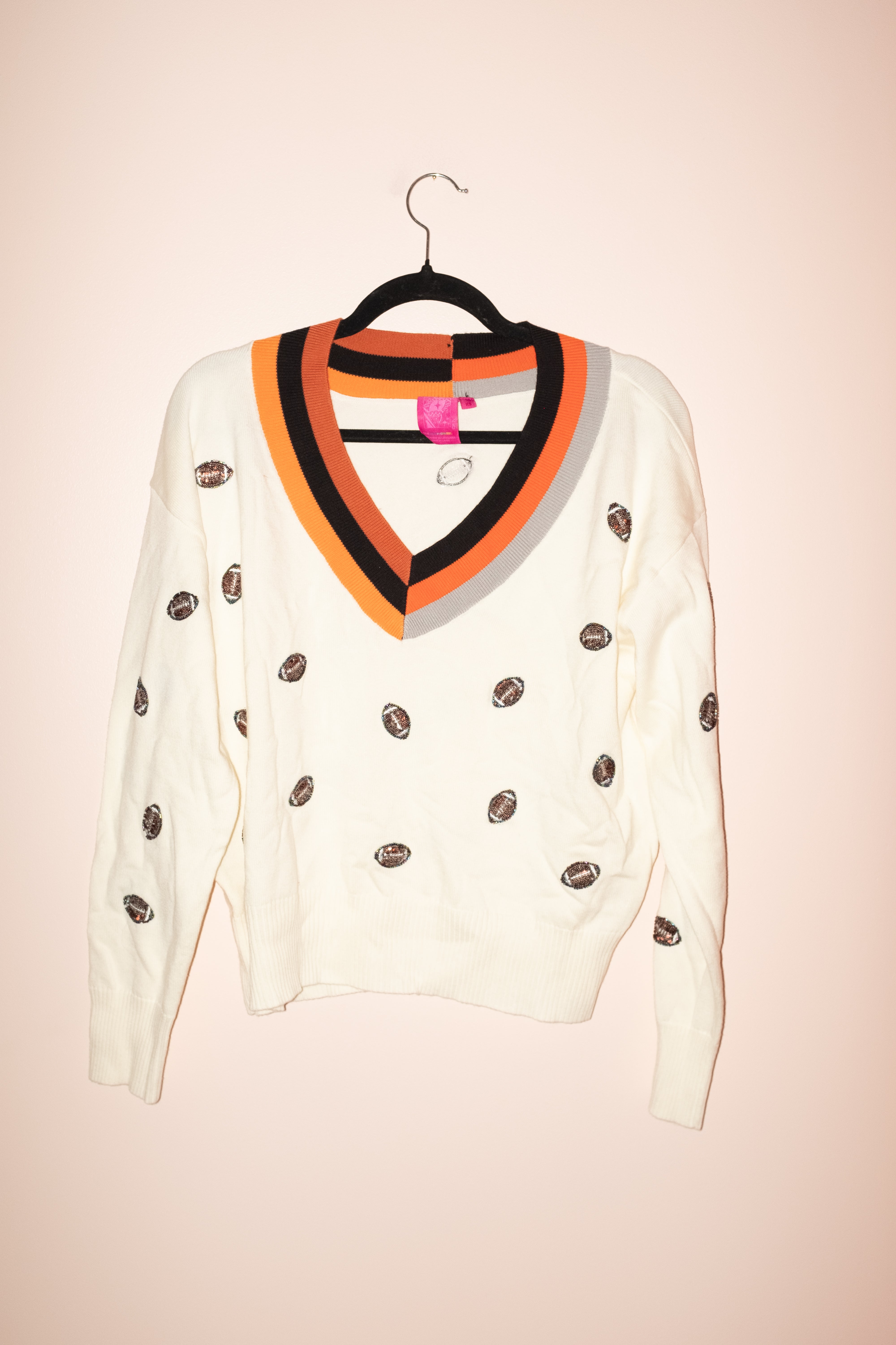 SAMPLE- IVORY, ORANGE & BLACK V NECK SCATTER FOOTBALL SWEATER