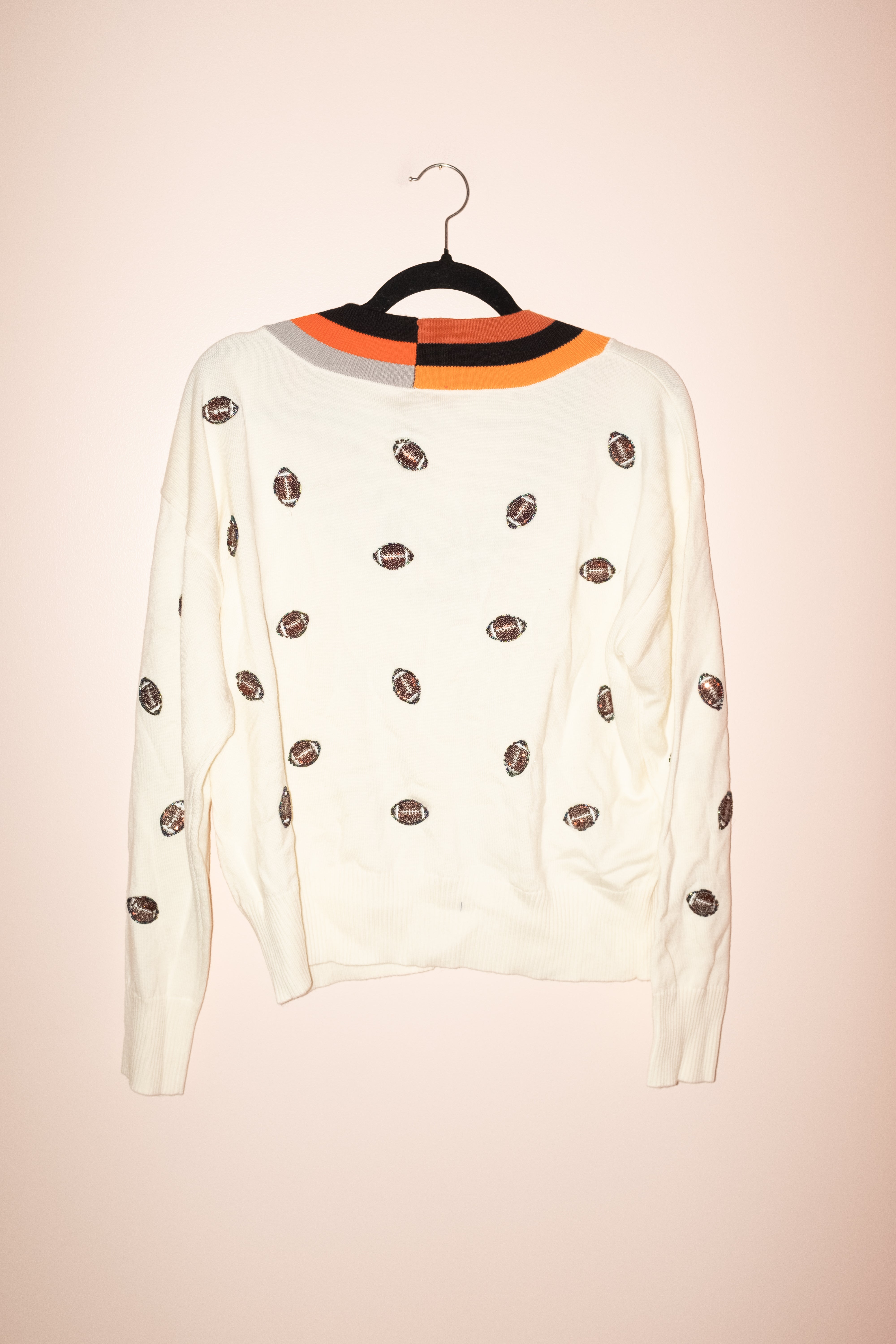 SAMPLE- IVORY, ORANGE & BLACK V NECK SCATTER FOOTBALL SWEATER