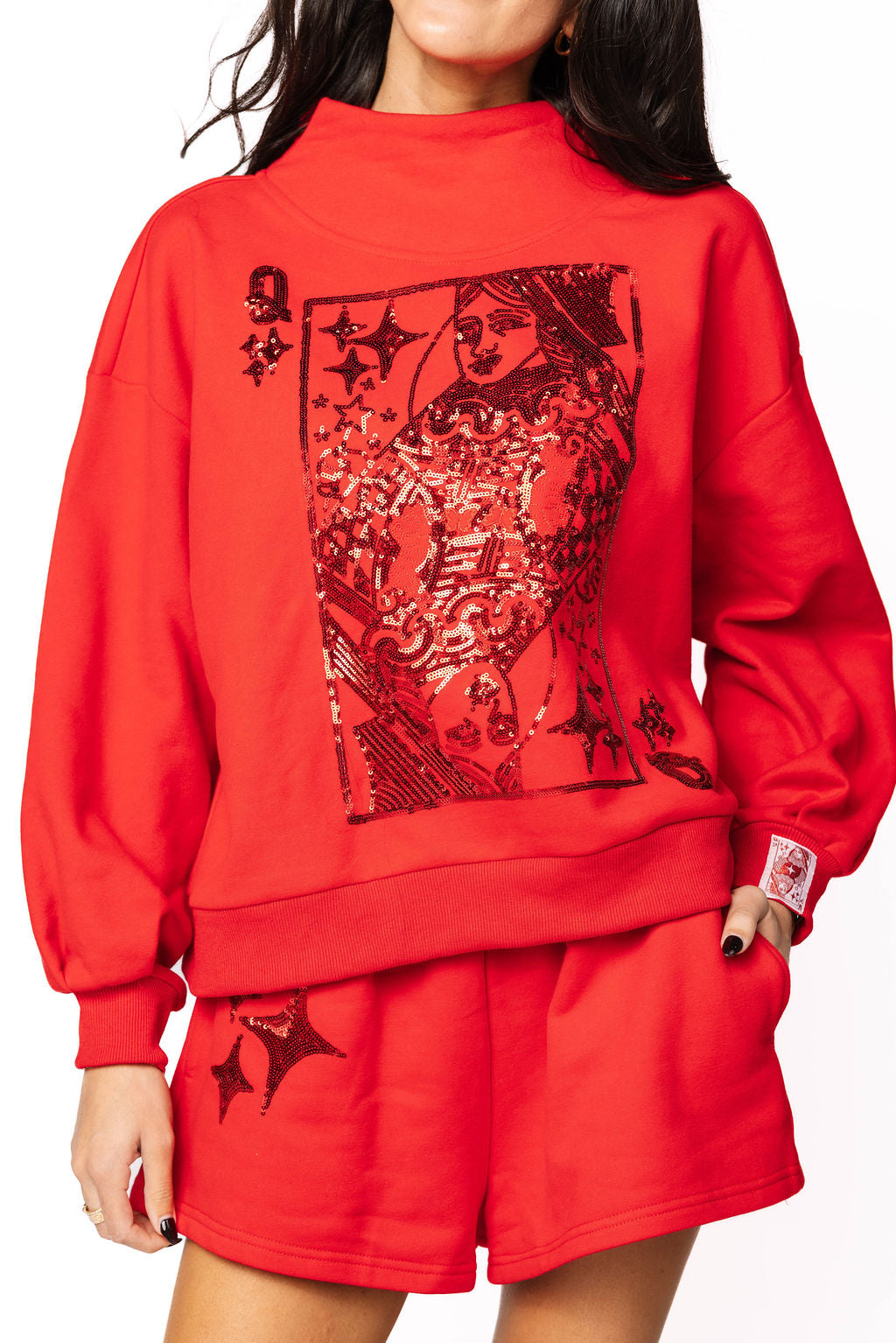 Red QOS Sparkle Logo Short